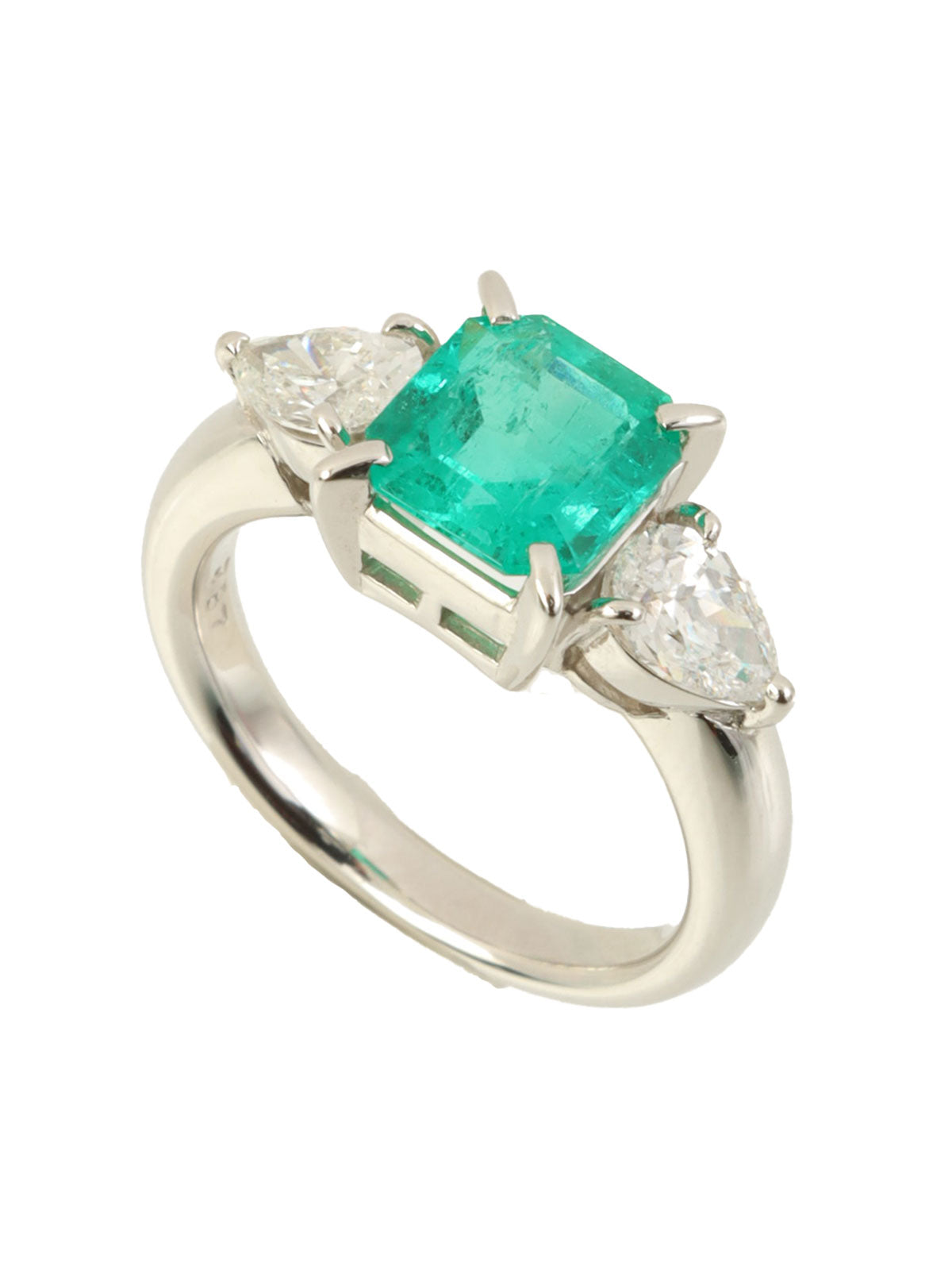 Platinum emerald and diamond ring in silver/green