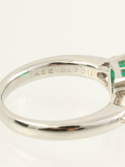 Platinum emerald and diamond ring in silver/green