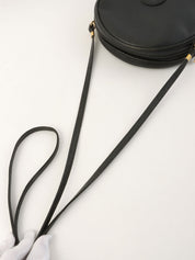 GG Embossed Round Shoulder Bag in Black