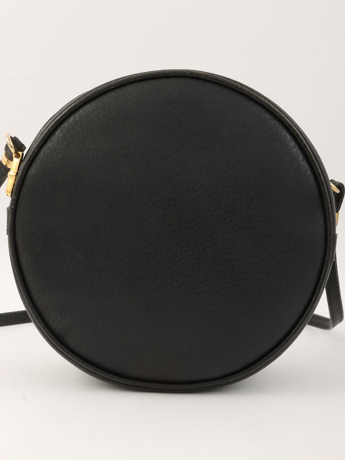 GG Embossed Round Shoulder Bag in Black