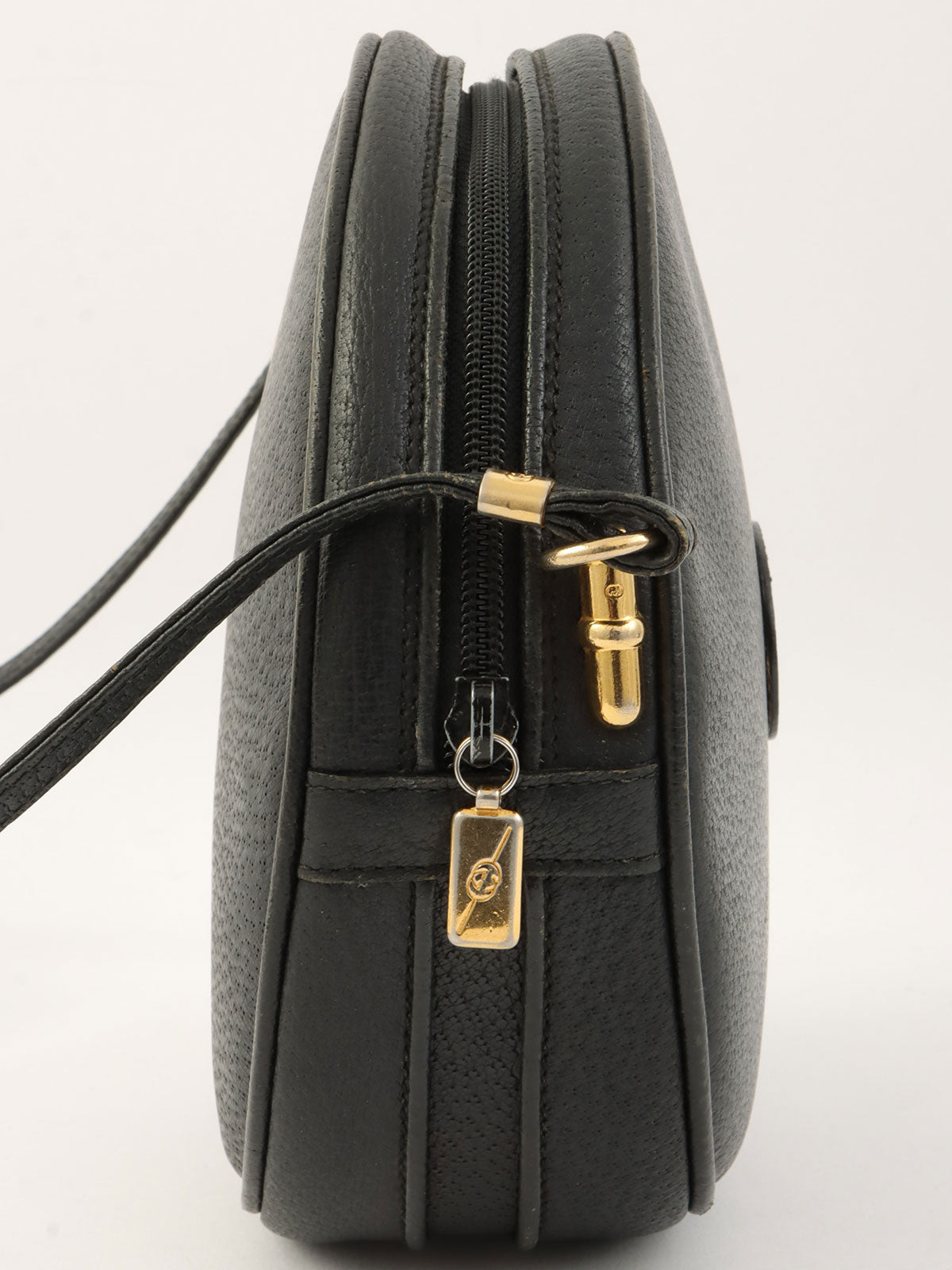 GG Embossed Round Shoulder Bag in Black