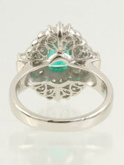Platinum emerald and diamond design ring in silver/green