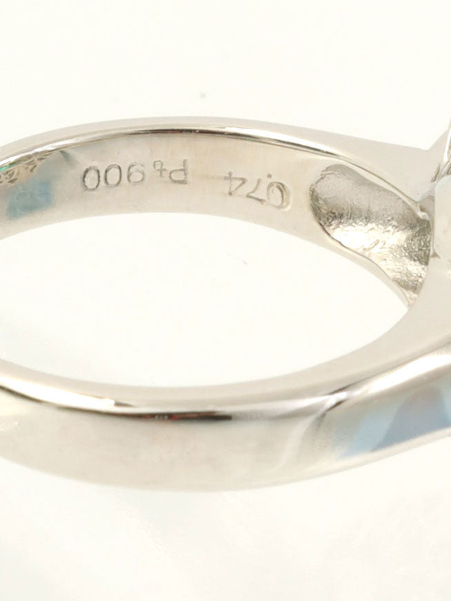 Platinum emerald and diamond design ring in silver/green