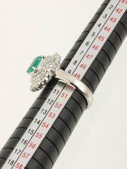 Platinum emerald and diamond design ring in silver/green