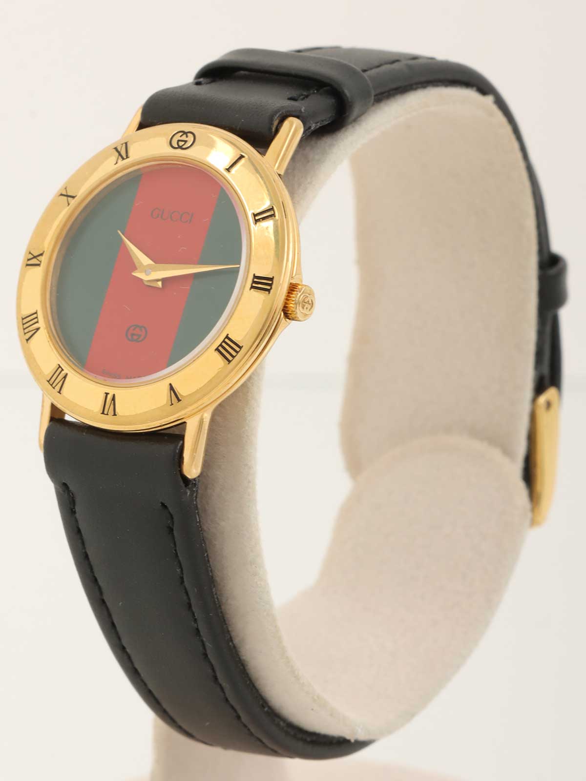 ラウンドロゴシェリーラインフェイスウォッチ　ゴールド／ブラック／マルチ