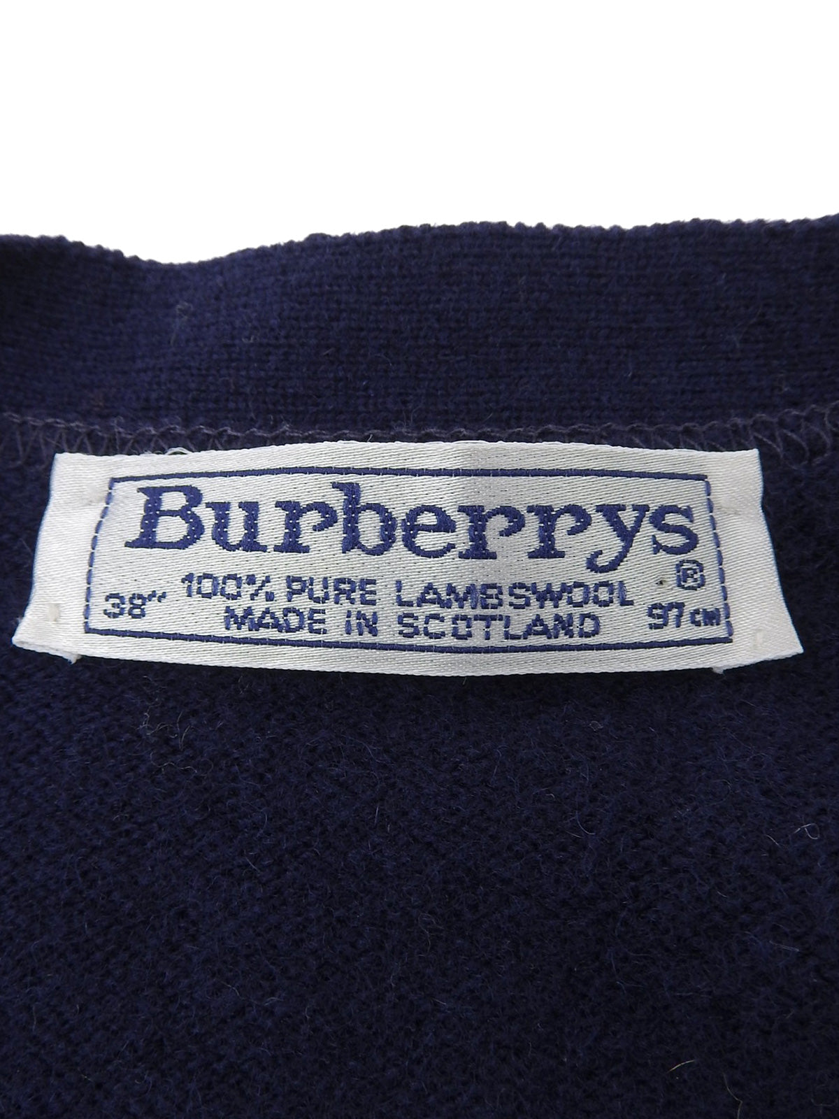 Argyle pattern cardigan in navy/red/white