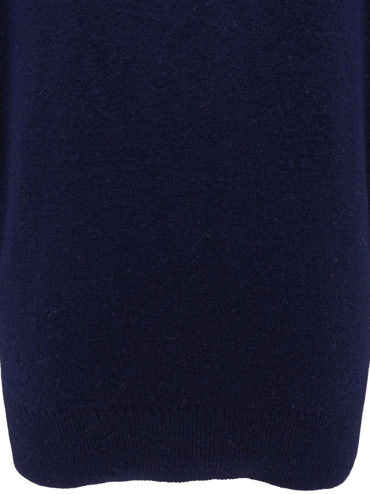 Argyle pattern cardigan in navy/red/white