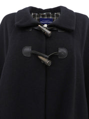 Angora Logo Embossed Poncho in Black