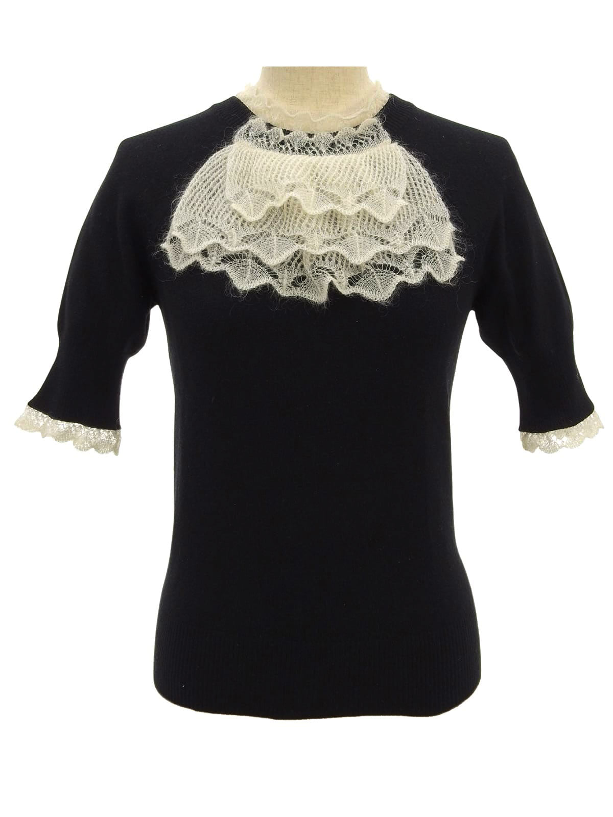 Cashmere ruffle design short sleeve knit top in black/white