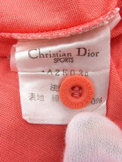 珊瑚粉色长袖polo衫，饰有品牌标志刺绣