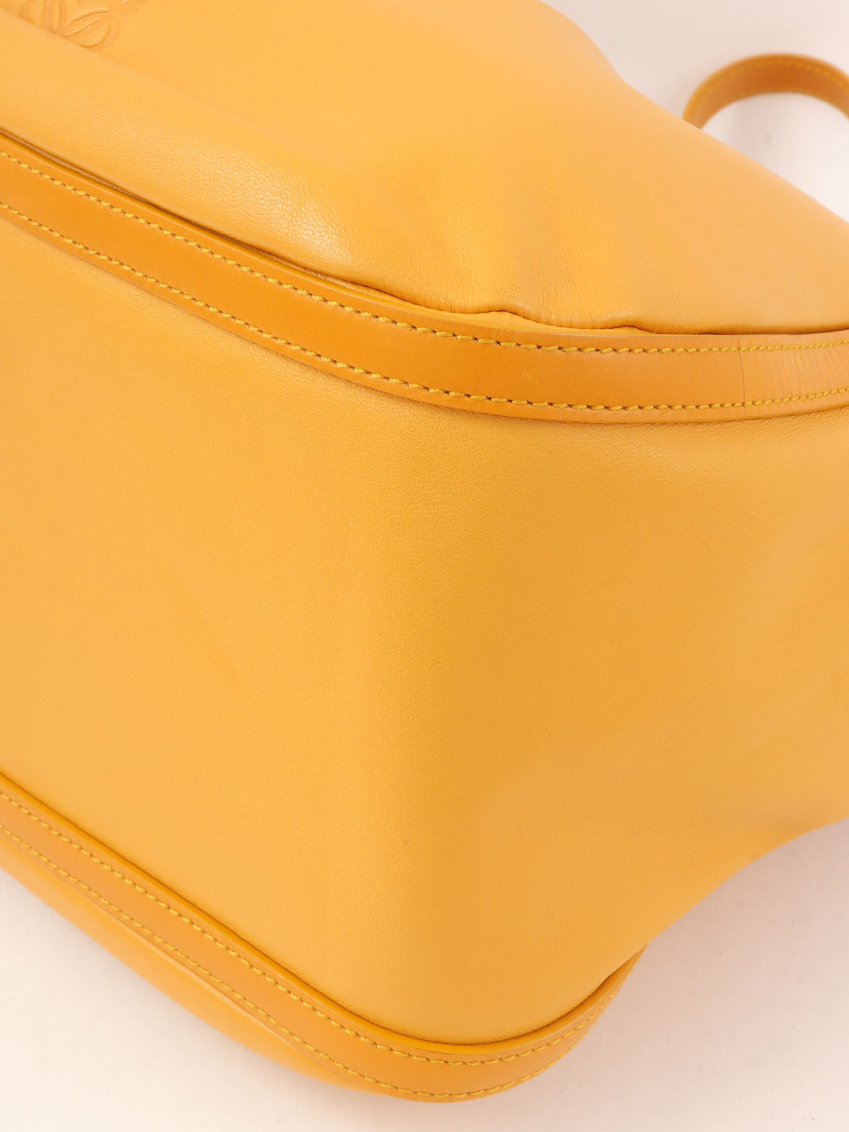 Anagram Embossed Shoulder Bag in Yellow