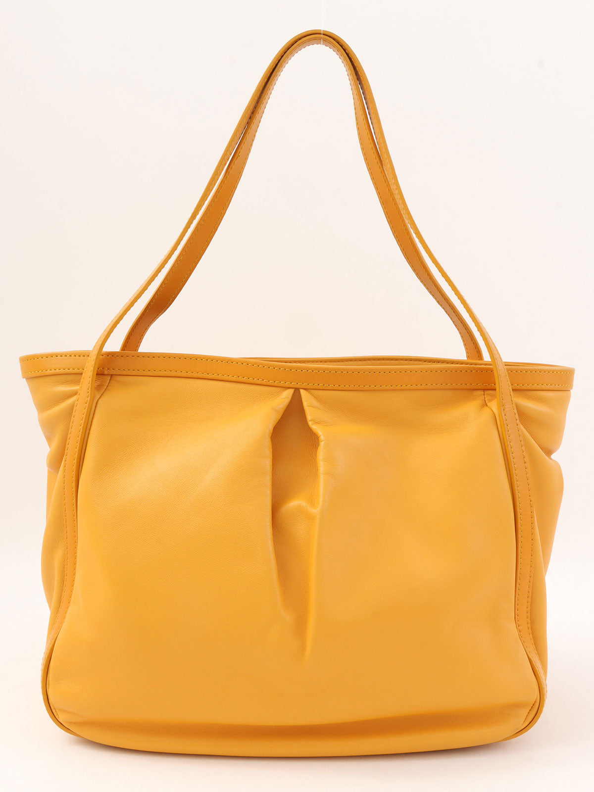 Anagram Embossed Shoulder Bag in Yellow