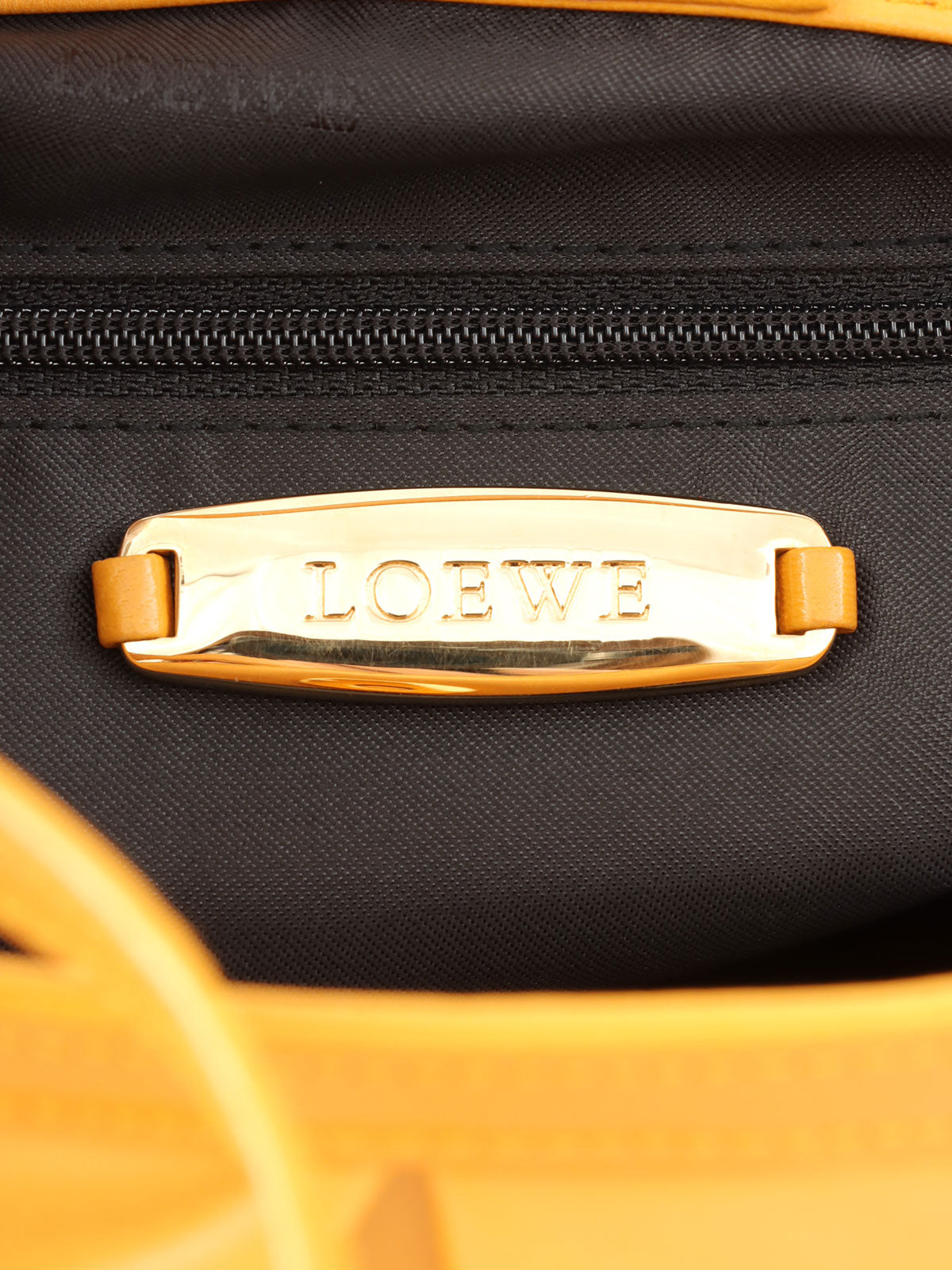 Anagram Embossed Shoulder Bag in Yellow