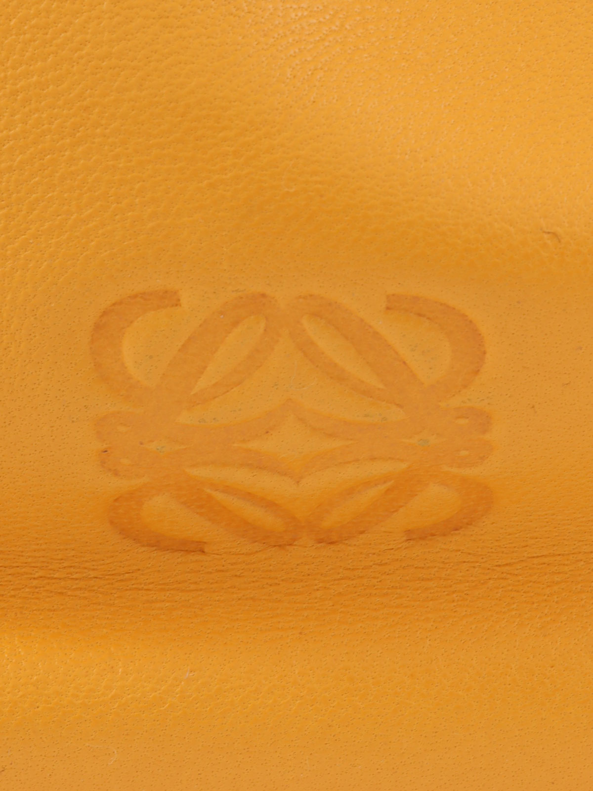 Anagram Embossed Shoulder Bag in Yellow