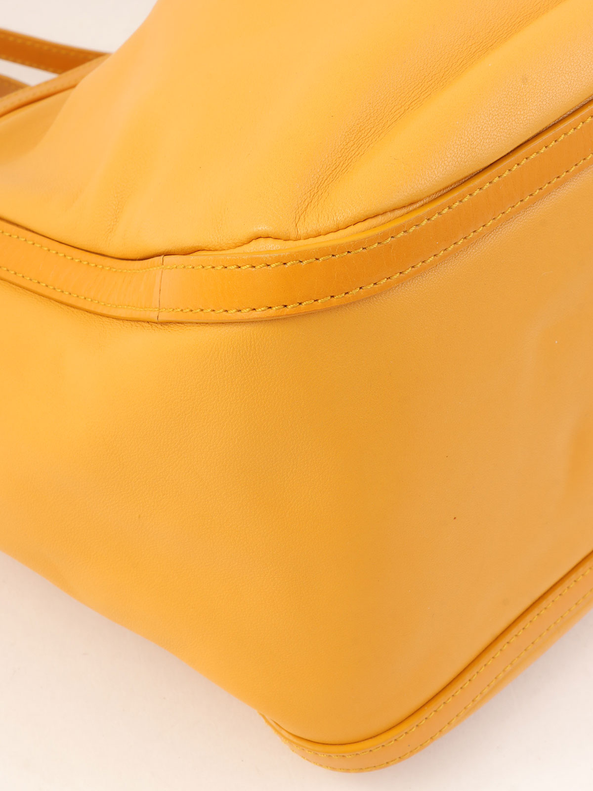 Anagram Embossed Shoulder Bag in Yellow