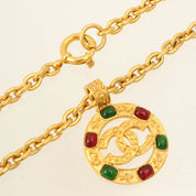 1994 Gripoix Design Cutout CC Mark Brooch in Gold/Green/Red