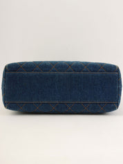 1997 年款 Denim CC 旋扣手提包，蓝色