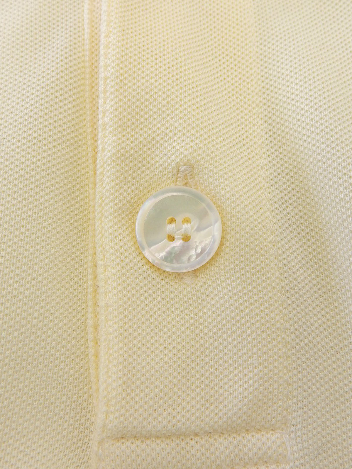 H logo embroidered polo shirt cream yellow
