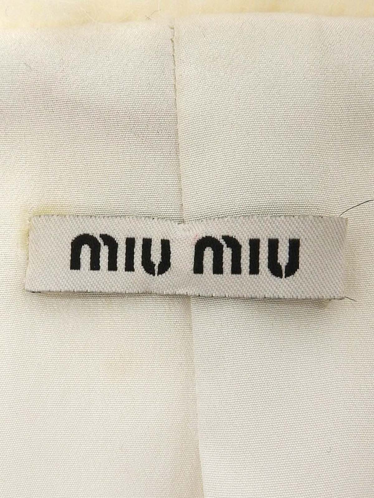 棕白色狐狸羊毛大衣