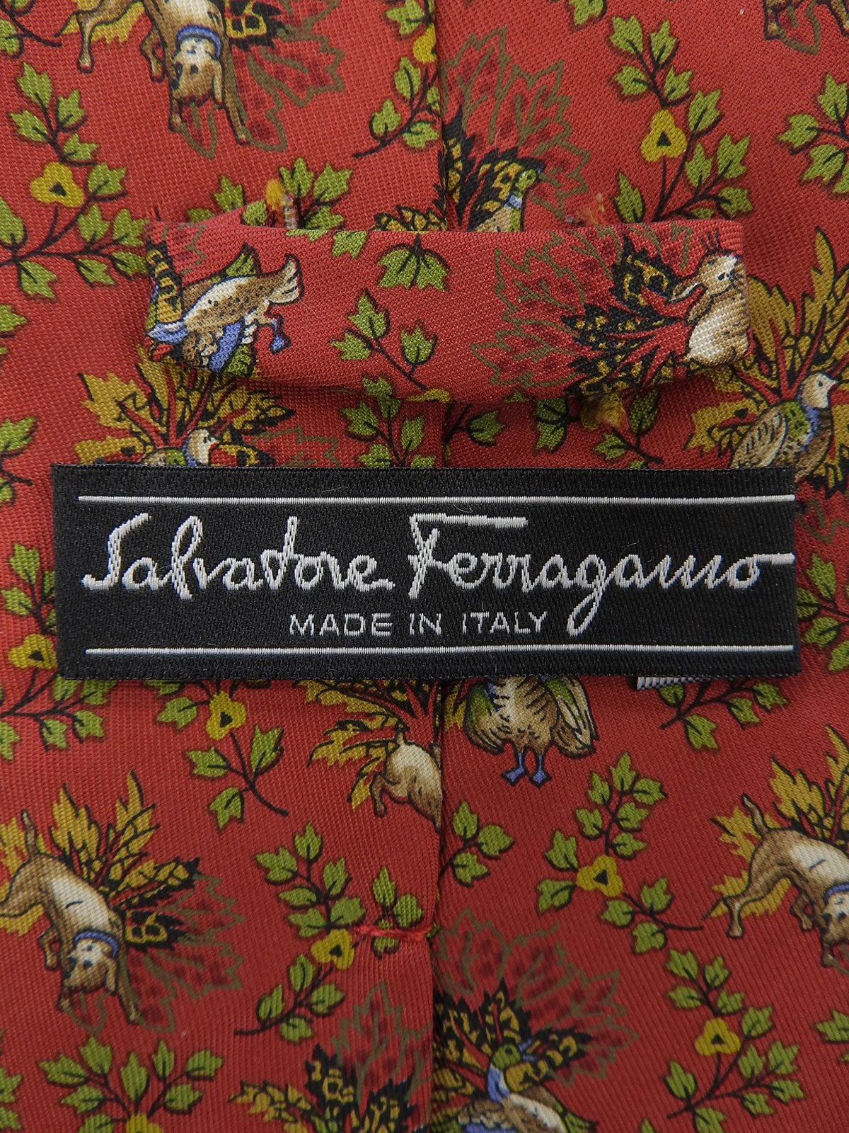 Animal pattern tie in red