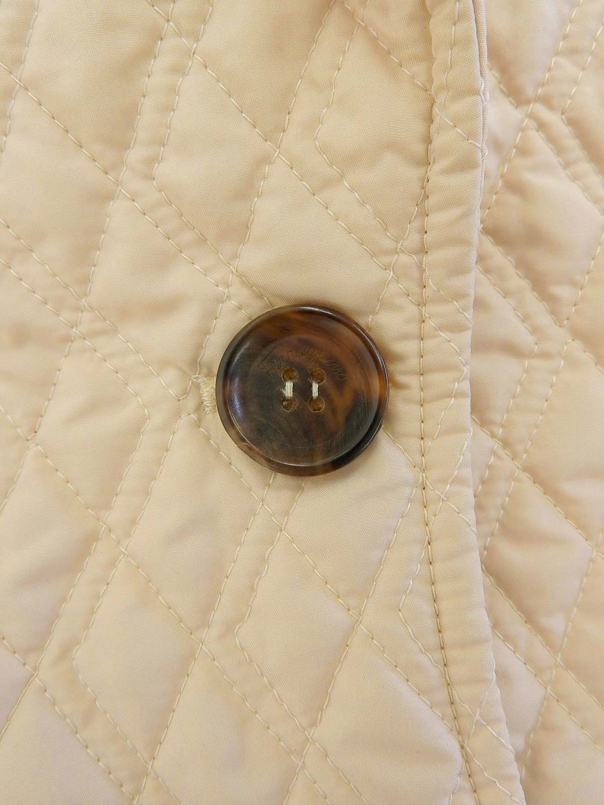 Quilted logo button jacket in ivory
