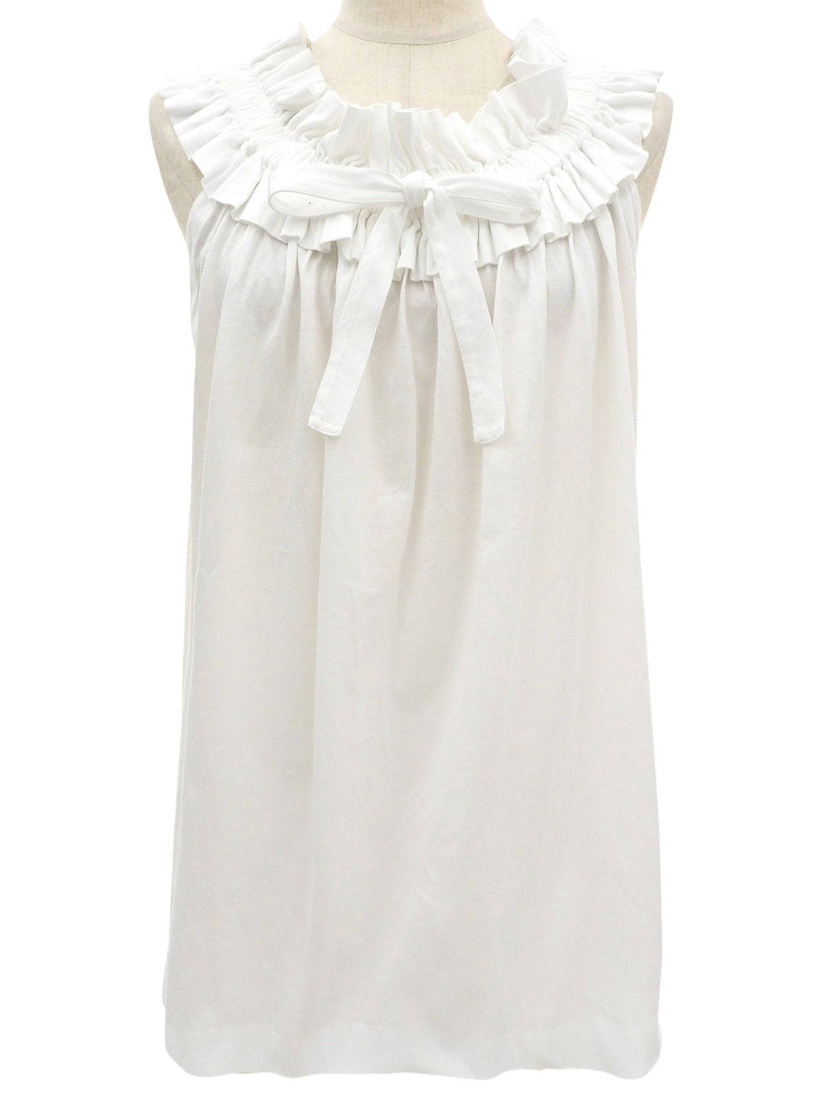 White ruffle sleeveless top