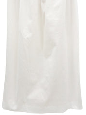 White ruffle sleeveless top