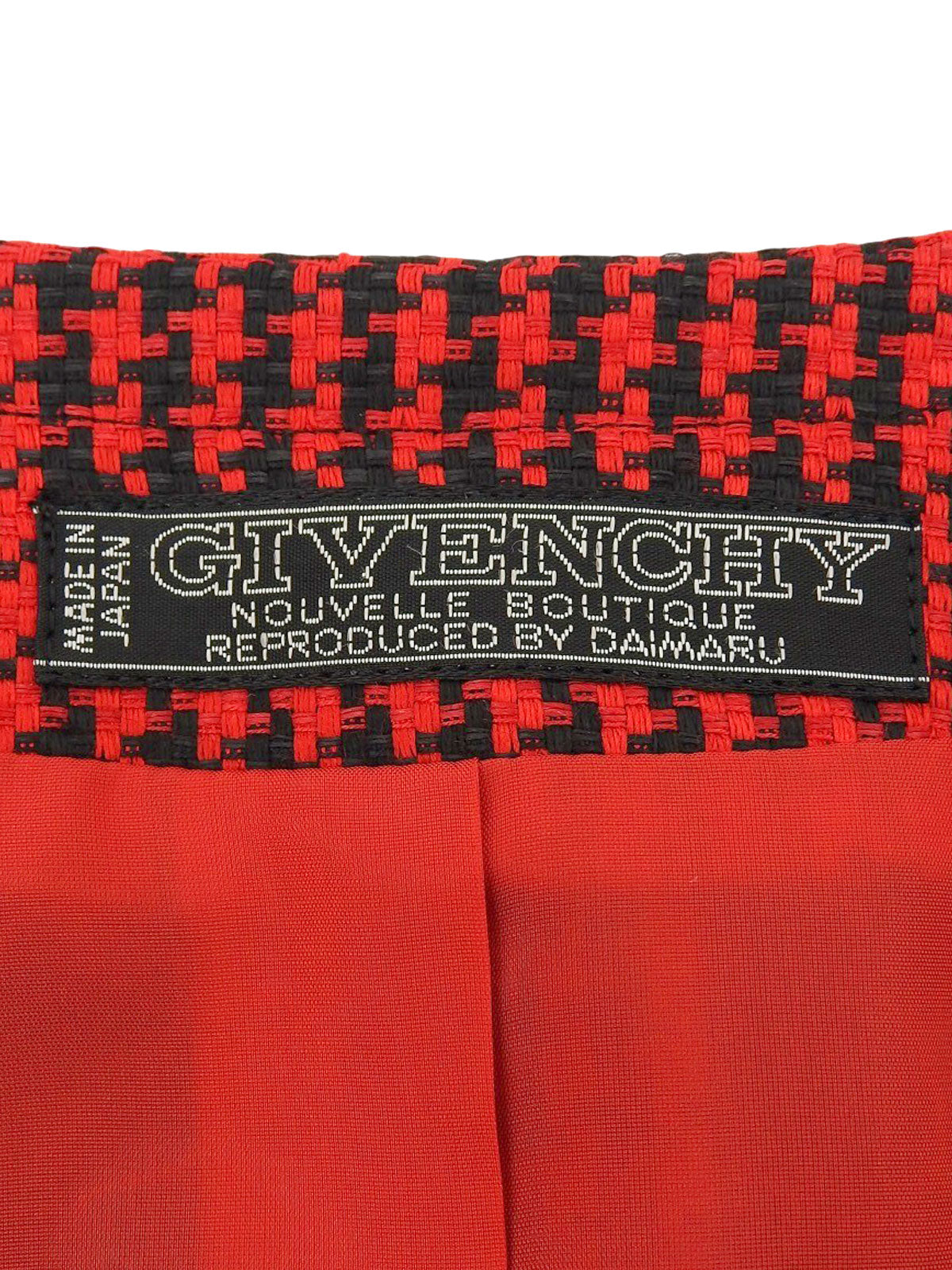 Houndstooth pattern collarless jacket in red/black