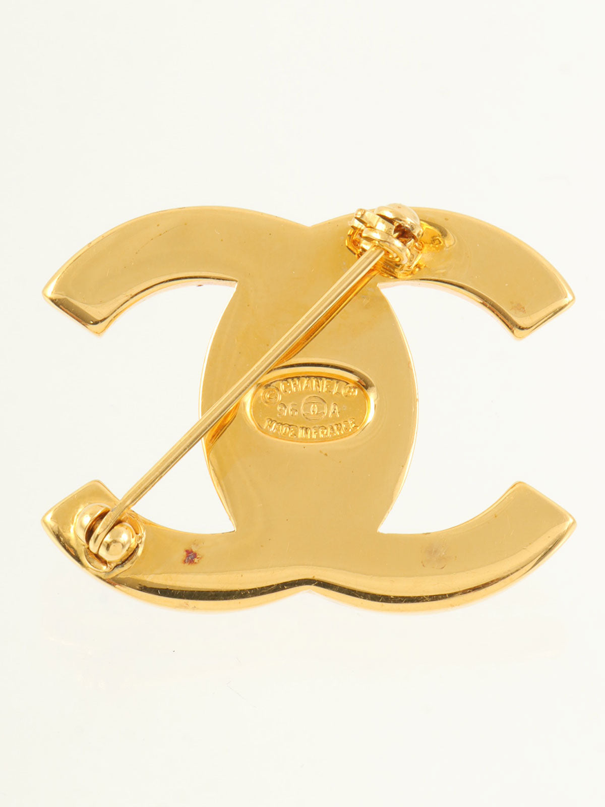 1996年製 ラインストーンCCターンロックブローチ ゴールド