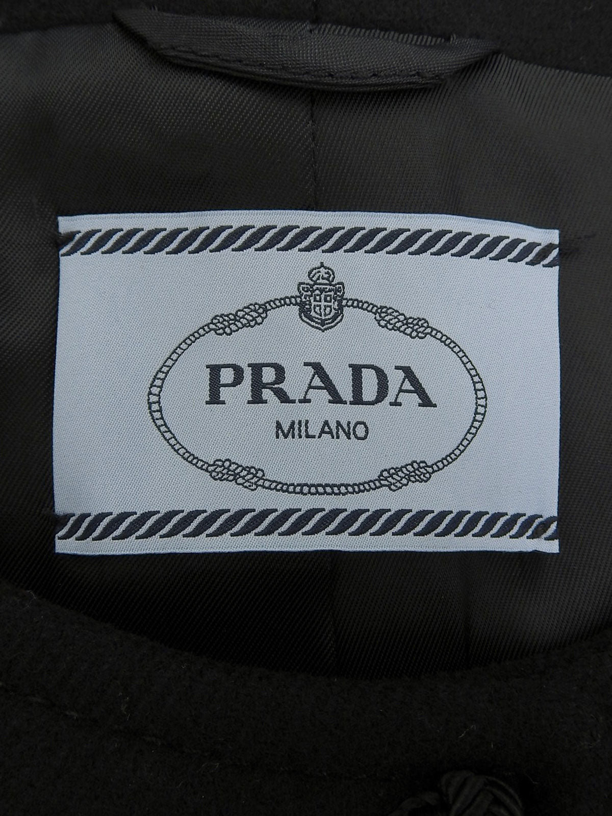 Embroidered collarless coat in black