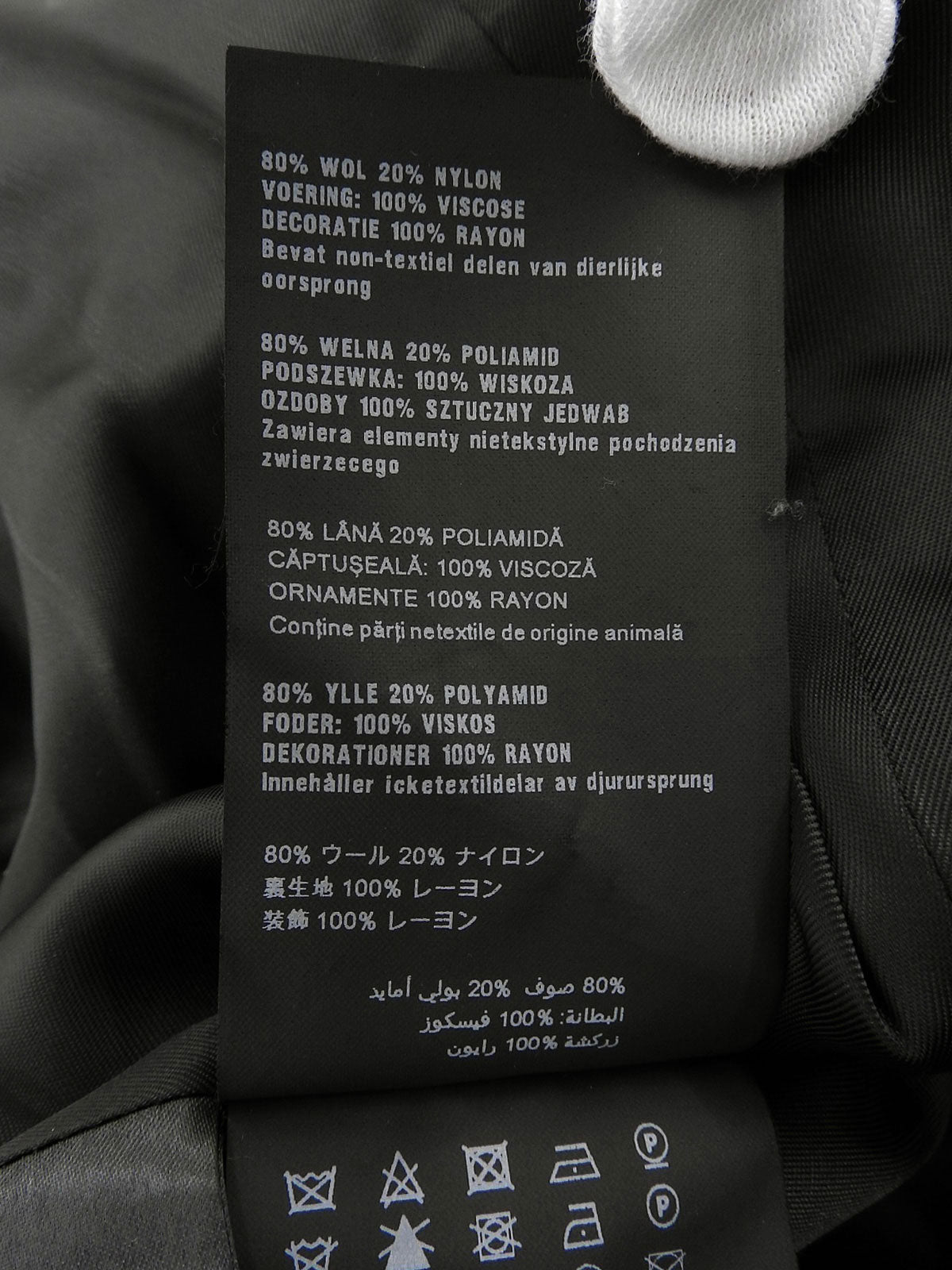 Embroidered collarless coat in black