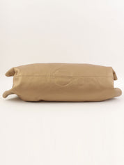 Nappa Aire Anagram Embossed Handbag in Gold