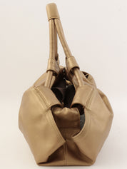 Nappa Aire Anagram Embossed Handbag in Gold