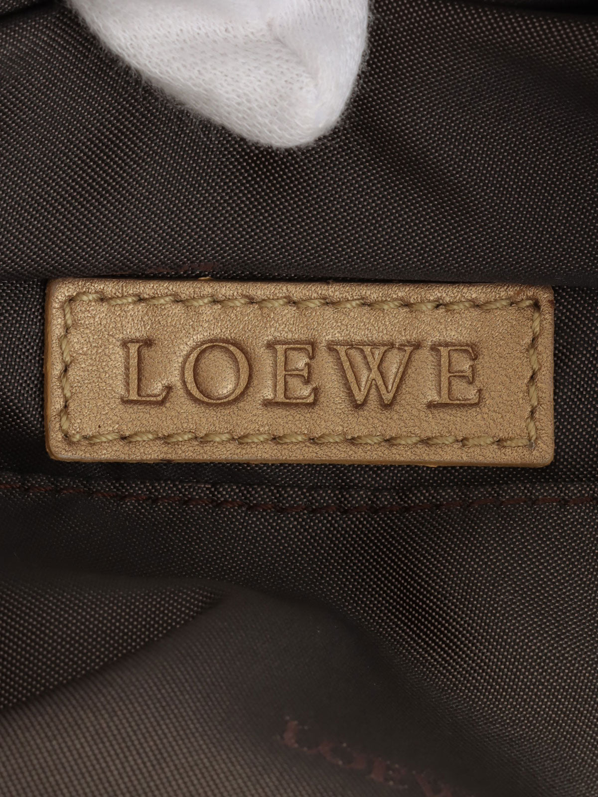 Nappa Aire Anagram Embossed Handbag in Gold