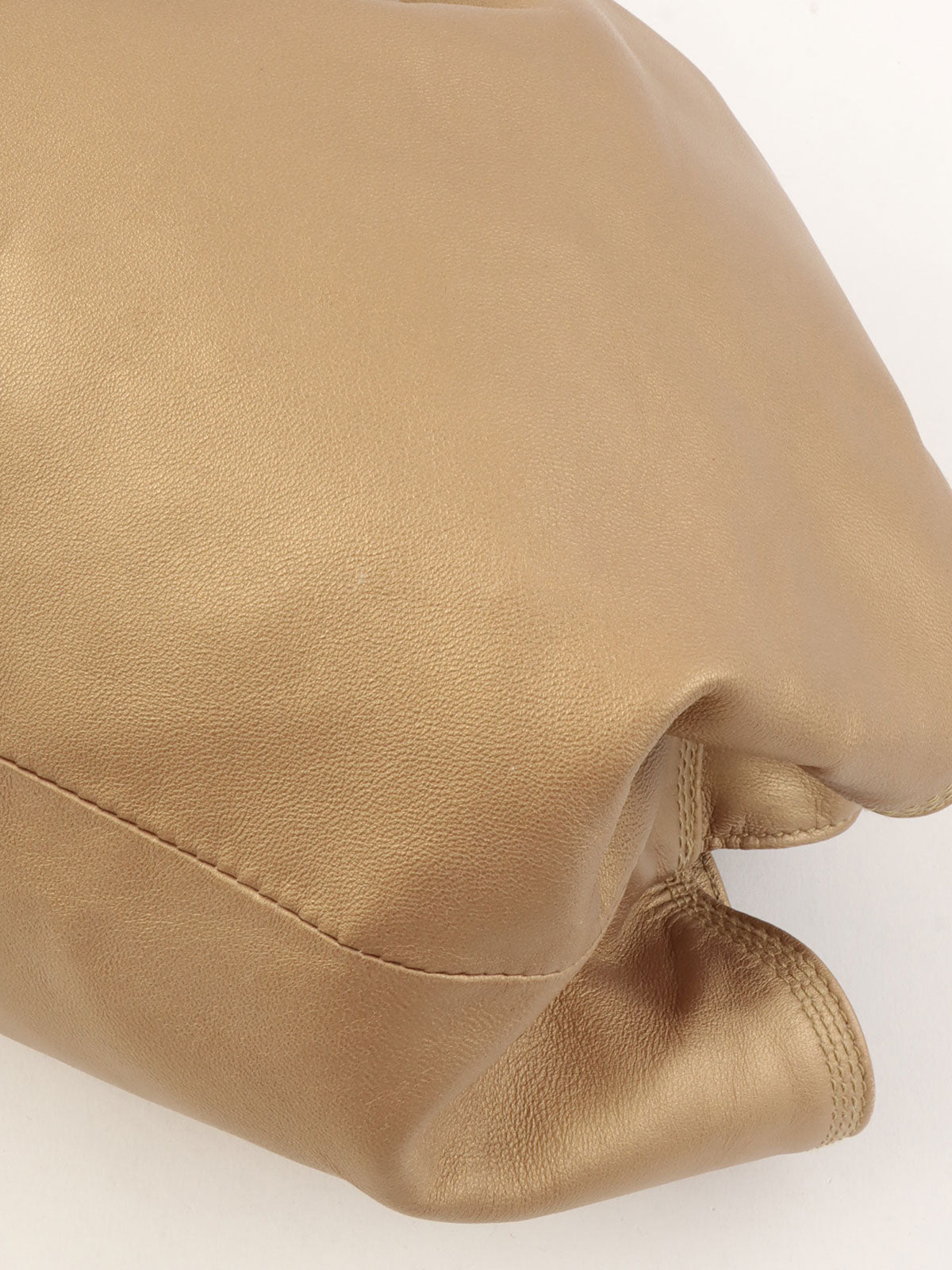 Nappa Aire Anagram Embossed Handbag in Gold