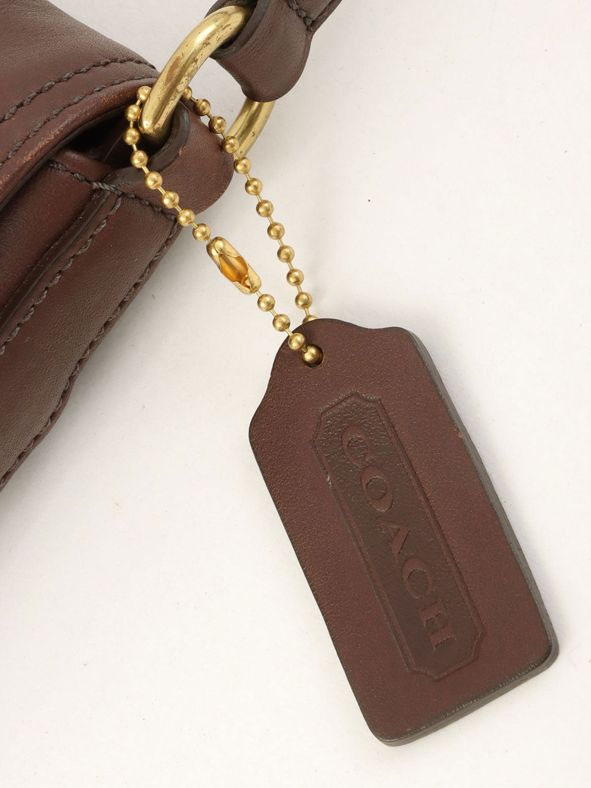 Logo Charm Shoulder Bag Brown