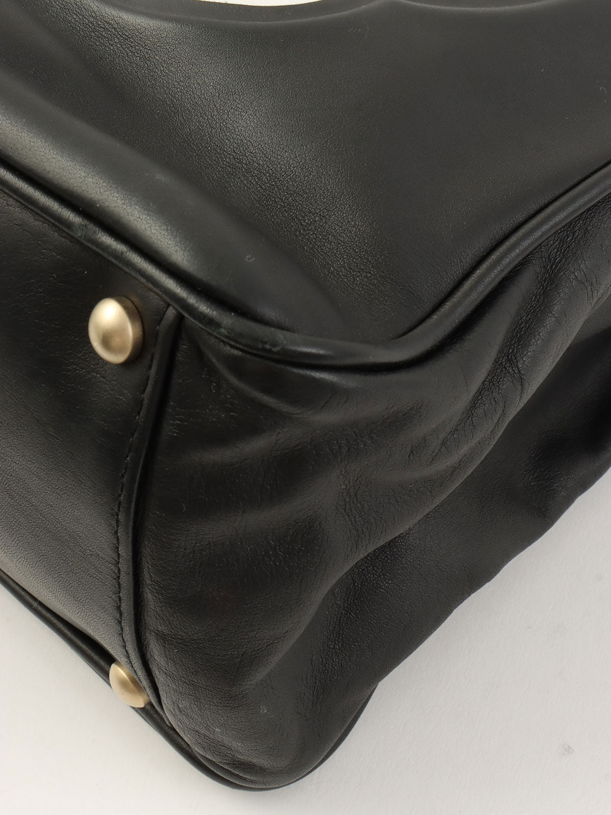 山茶花图案手提袋，黑色，约产于2001年