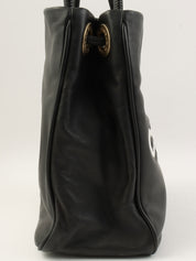 山茶花图案手提袋，黑色，约产于2001年