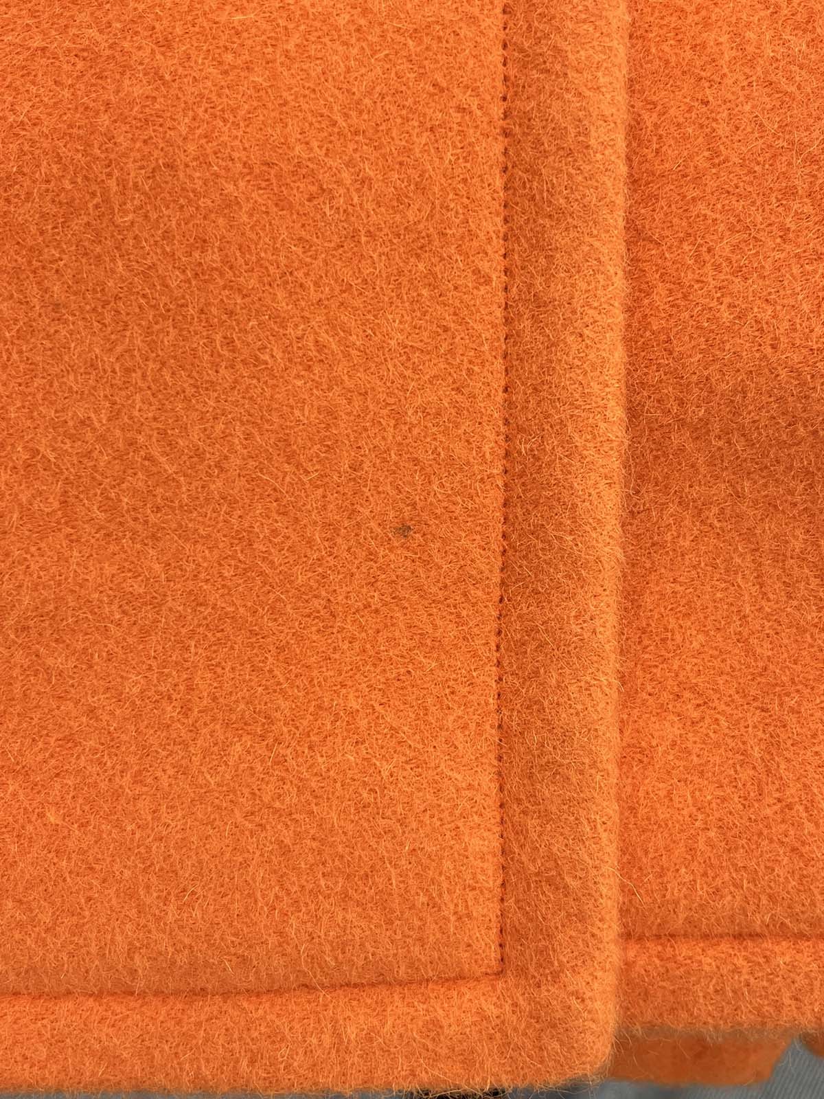 Two-tone wool coat in orange and black