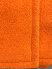 Two-tone wool coat in orange and black