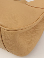 Beige leather logo plate handbag