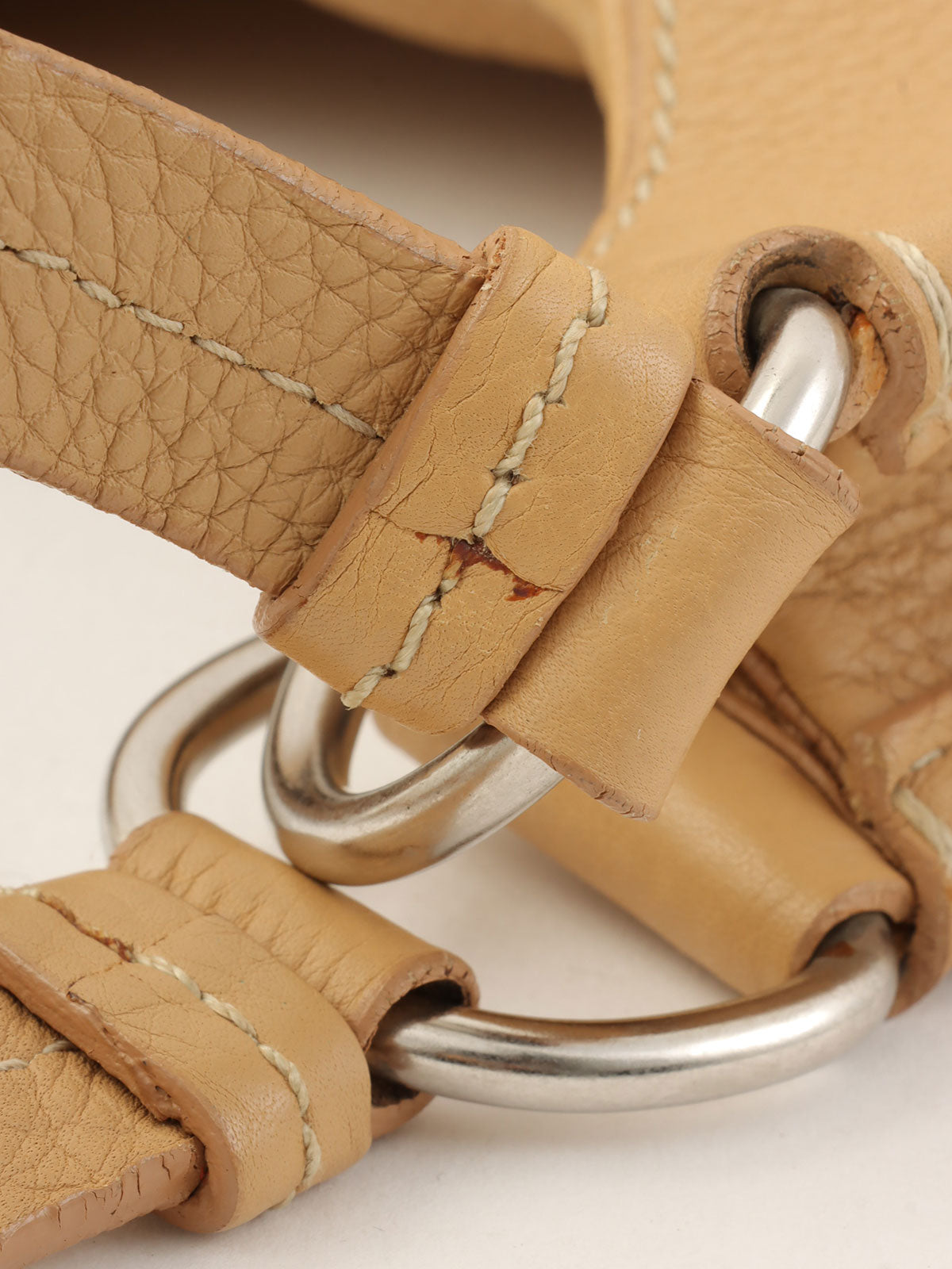 Beige leather logo plate handbag