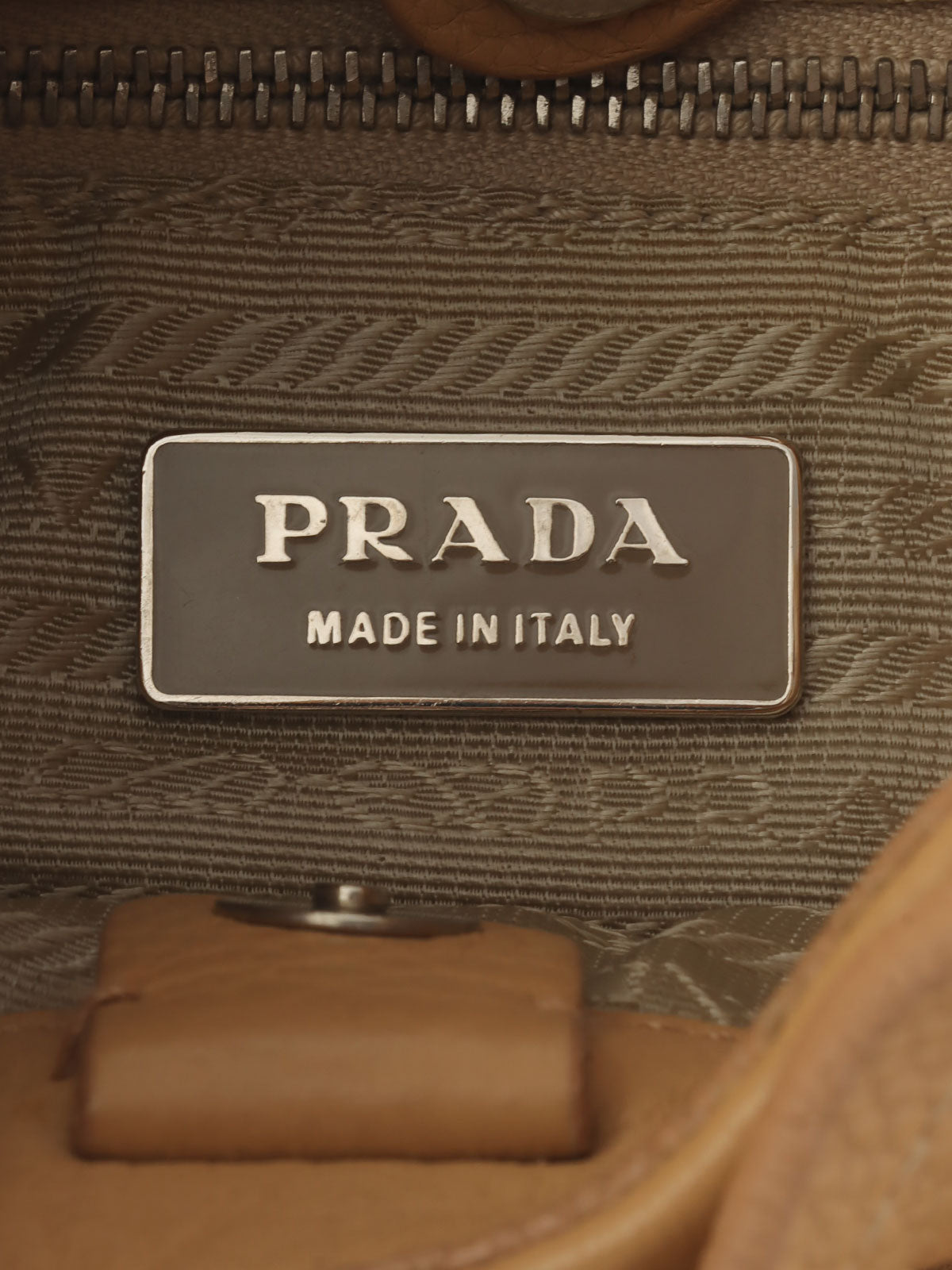 Beige leather logo plate handbag