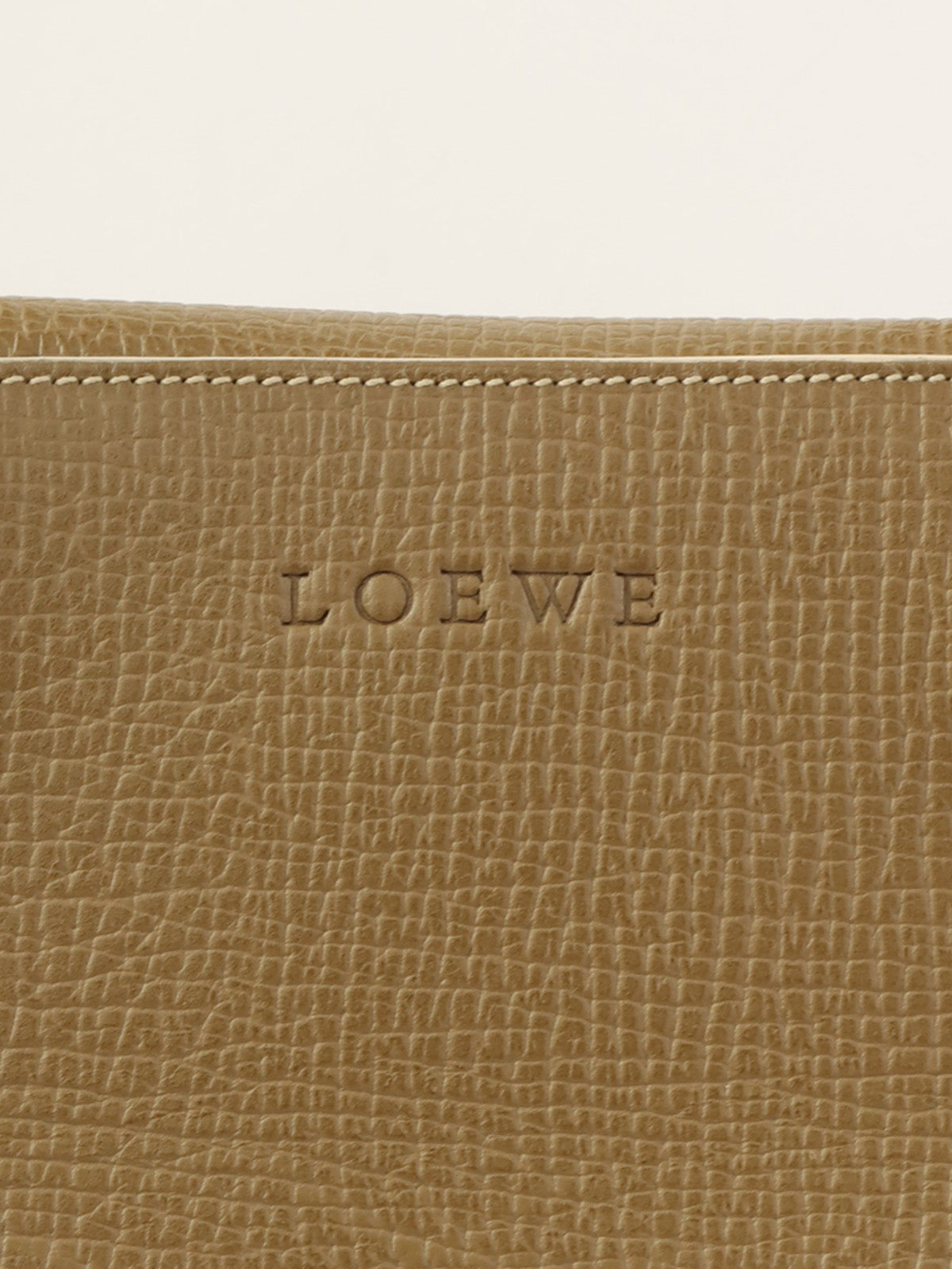 Logo embossed handbag in khaki