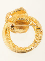Rhinestone rope motif brooch in gold