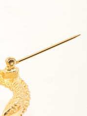 Rhinestone rope motif brooch in gold