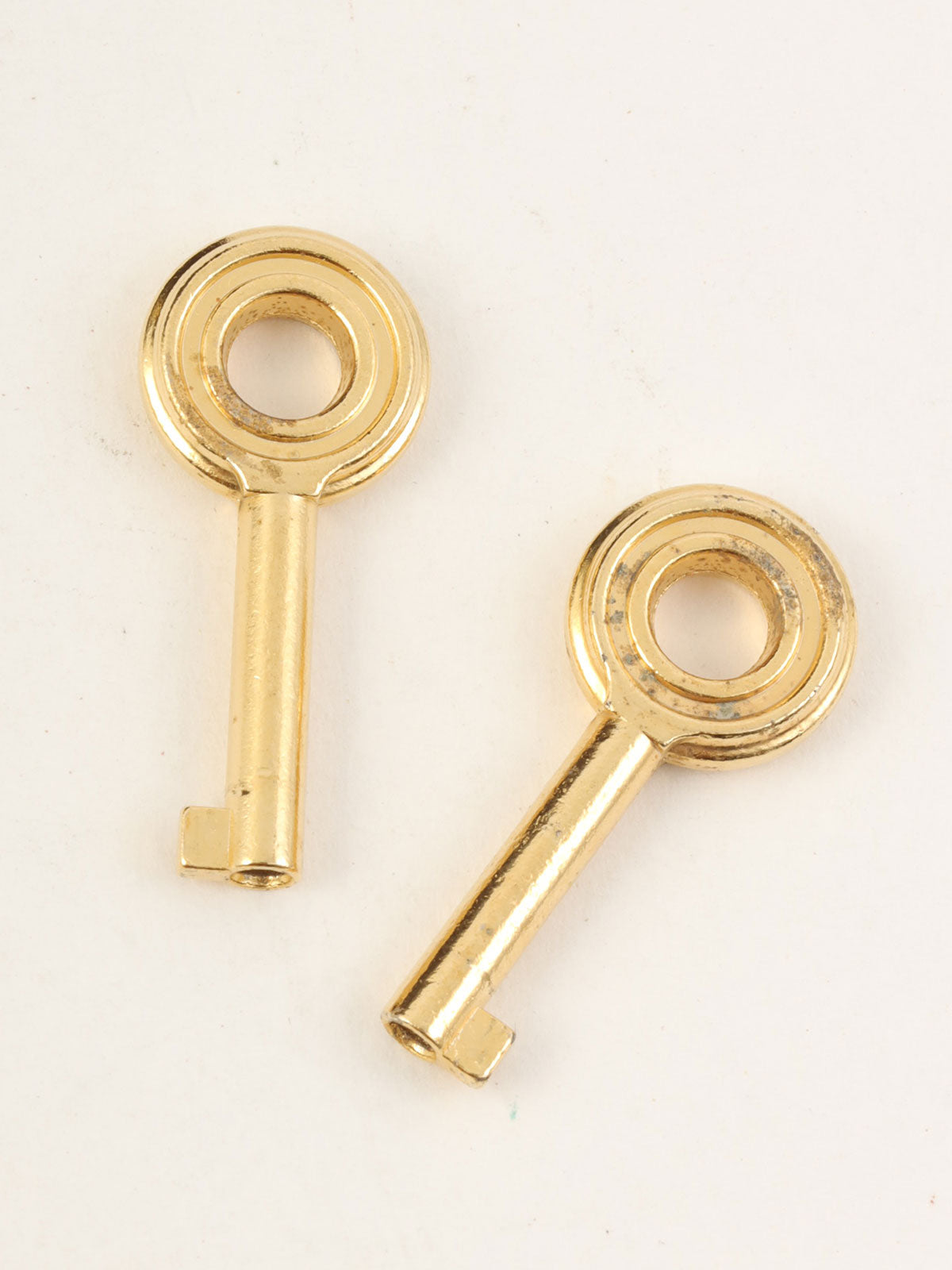 棕色Anagram压纹手拿包