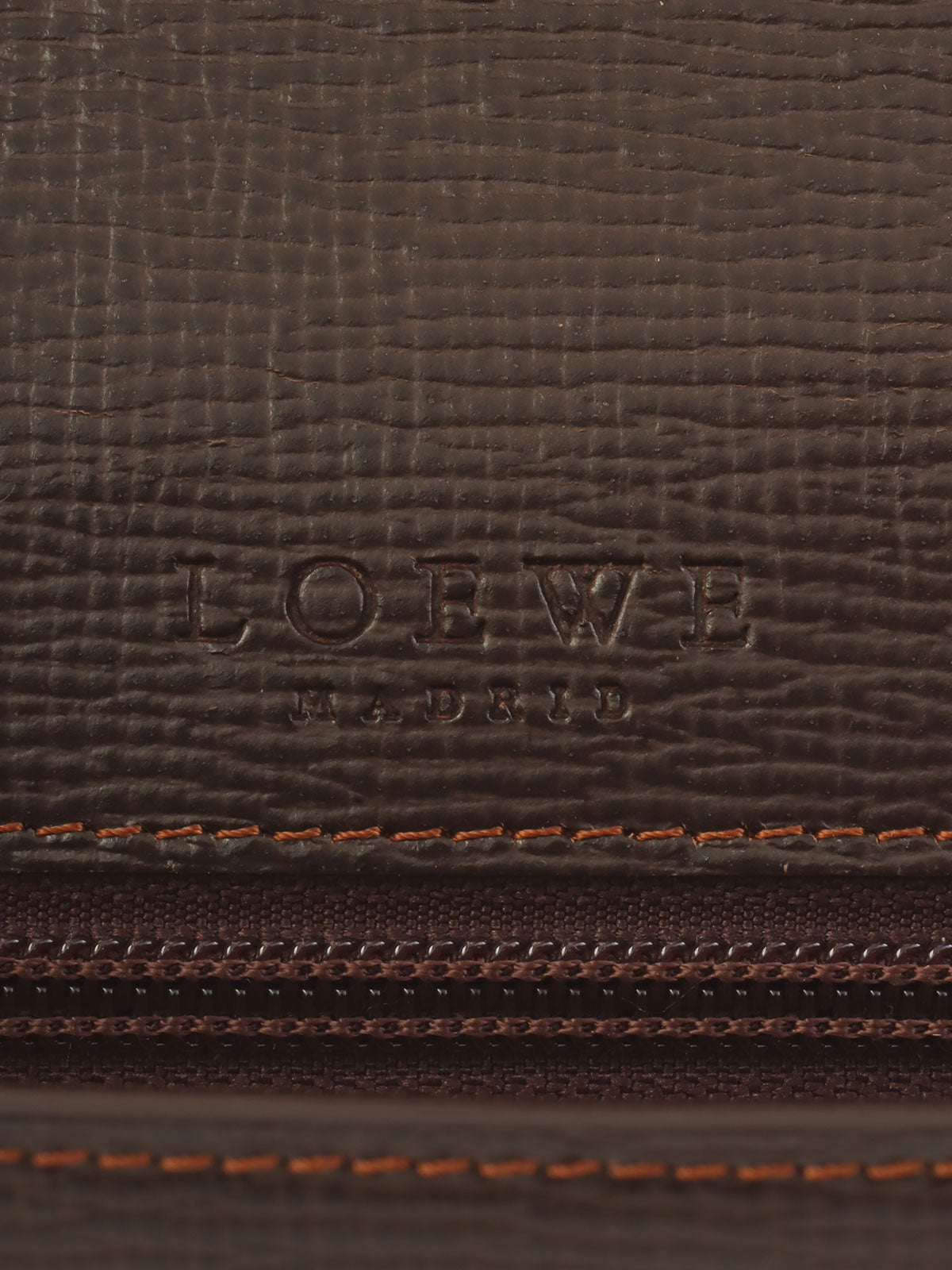 棕色Anagram压纹手拿包