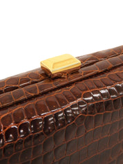 棕色鳄鱼扣手拿包