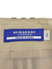 米色格纹喇叭裙